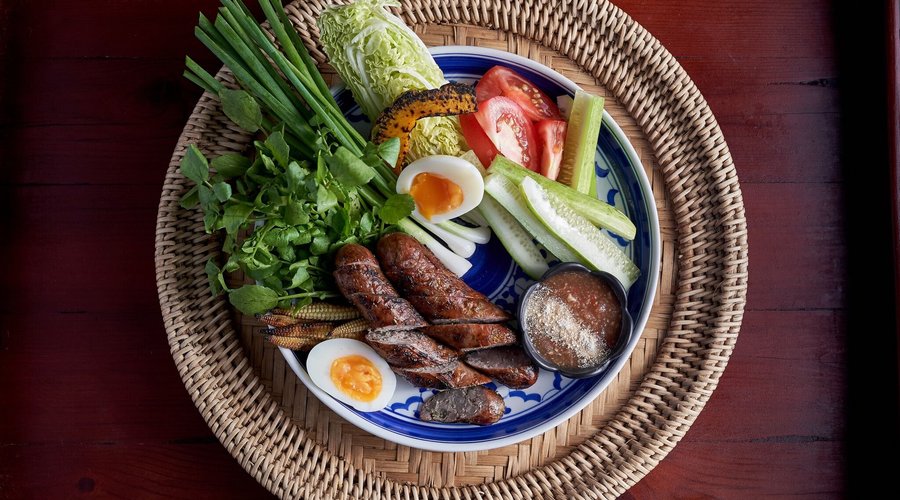 Sai Oua, Luang Prabang grilled local sausage, chili dip and raw vegetables