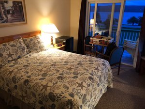 Cabot Trail Motel & Cabot Restaurant in Cape Breton Island, image may contain: Furniture, Bed, Chair, Bedroom