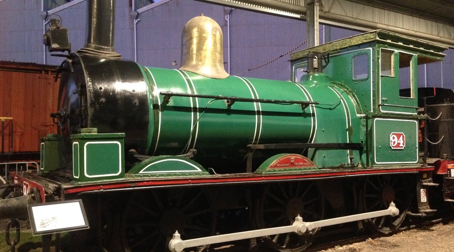 Our second-oldest locomotive, locomotive T94, sitting under our new roofed section and gleaming after a recent bit of tender loving care from our volunteers. 