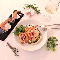 Grilled prawns with garlic puree and green oil