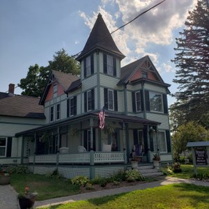 Gorgeous and colorful, The Henniker House has numerous outdoor seating areas. Relax on the Rivah!