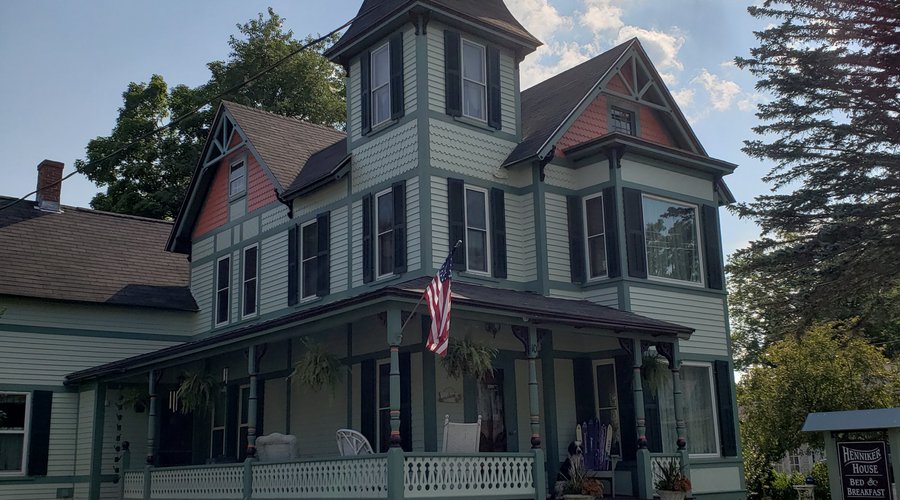 Gorgeous and colorful, The Henniker House has numerous outdoor seating areas. Relax on the Rivah!