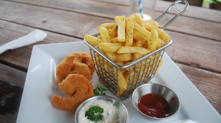 Homemade coconut shrimp with black pepper and salt fries. I started to eat, then remembered to take the picture. It looked so good I forgot. It comes with more than three shrimps. LOL!