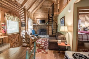 Mountainaire Inn and Log Cabins in Blowing Rock, image may contain: Wood, Interior Design, Housing, Staircase