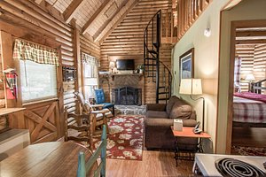 Mountainaire Inn and Log Cabins in Blowing Rock, image may contain: Wood, Interior Design, Housing, Staircase
