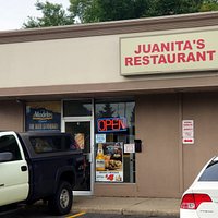 front of & entrance to Juanita's Restaurant