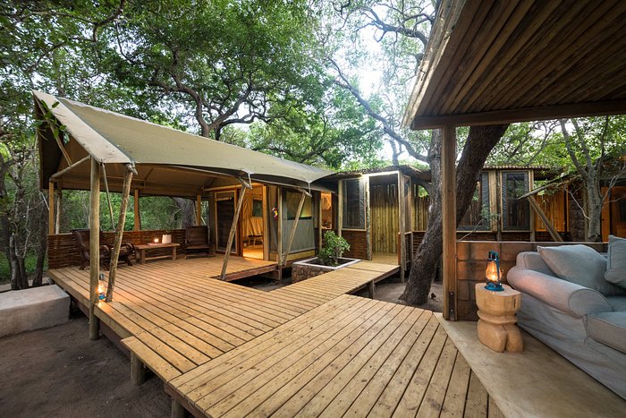 This is a spacious luxury safari tent with an off set bathroom, outside shower, a bath, his and her amenities, spacious deck overlooking the bushveld and a private pergola with a day bed.