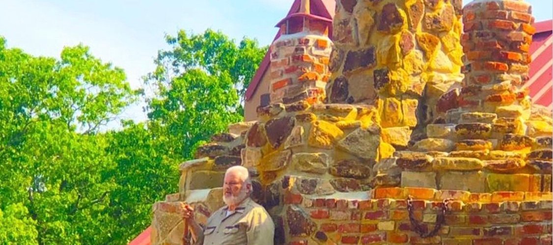 Palace of Depression Restoration Association President Kevin J. Kirchner standing on the Grand Old Fireplace Chimney Pulpit while dressed as original Palace Builder George Daynor for Vineland Founders Day 2019