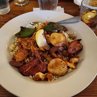 JAMBALAYA shrimp, scallops, fresh fish, andouille sausage, ‘trinity” vegetables, tomatoes, dirty rice