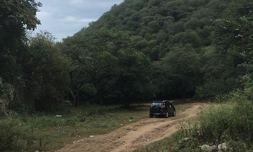 Approach through a jungle trail- need an SUV to reach