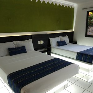 Habitación Doble con dos camas matrimoniales para 4 personas.