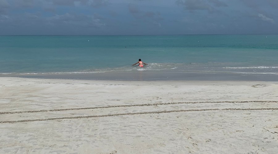 At the beach before catching our delayed flight