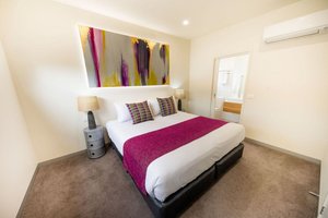 BIG4 Ingenia Holidays Queenscliff Beacon in Queenscliff, image may contain: Corner, Furniture, Bedroom, Bed