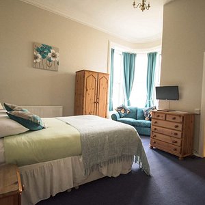 This beautiful double room has a bay window which overlooks the front of the hotel.