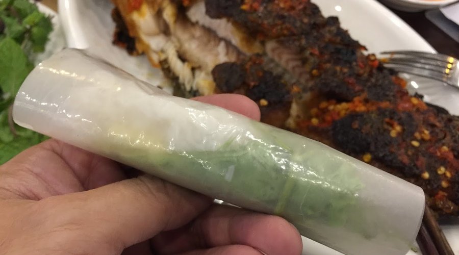 BBQ fish and self wrapped spring rolls, fresh herbs and salad provided to wrap with the BBQ meat.