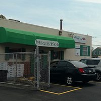 The front entrance and parking area at Mike's Deli