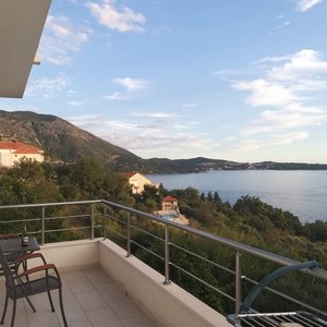 Large balcony with dining area and  drying rack