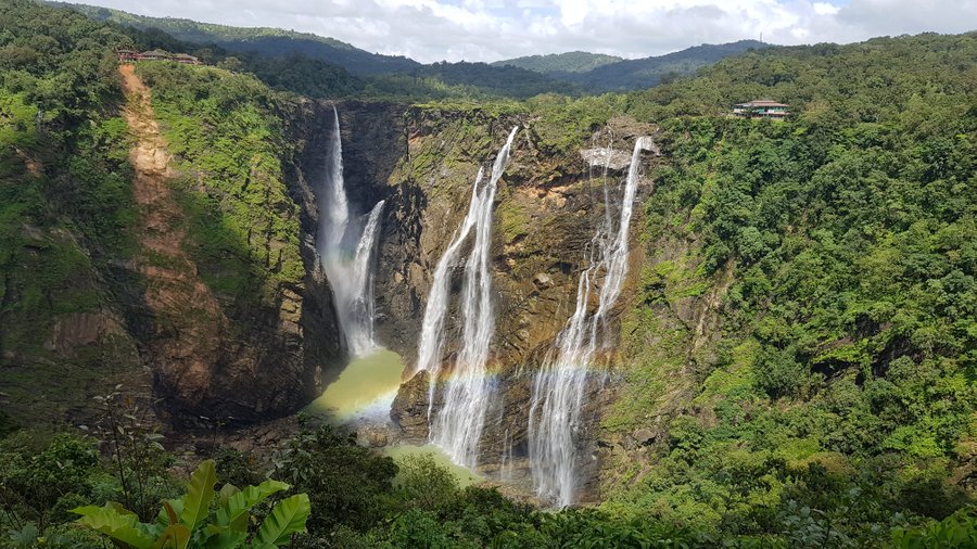 See the rainbow at the base of the falls