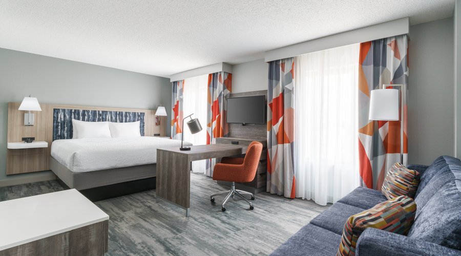The King Studio suite comes complete with a sofa bed, wet bar, and plush king bed.
