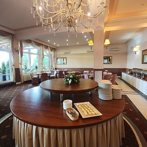 Hotel Tajty in Wilkasy, image may contain: Dining Room, Dining Table, Table, Chandelier