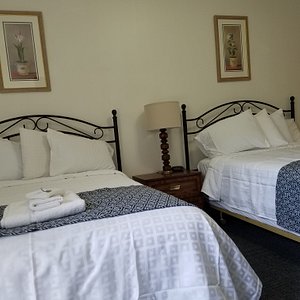 Each of our rooms have two double beds and a private bath.  We supply all of your linens & towels.