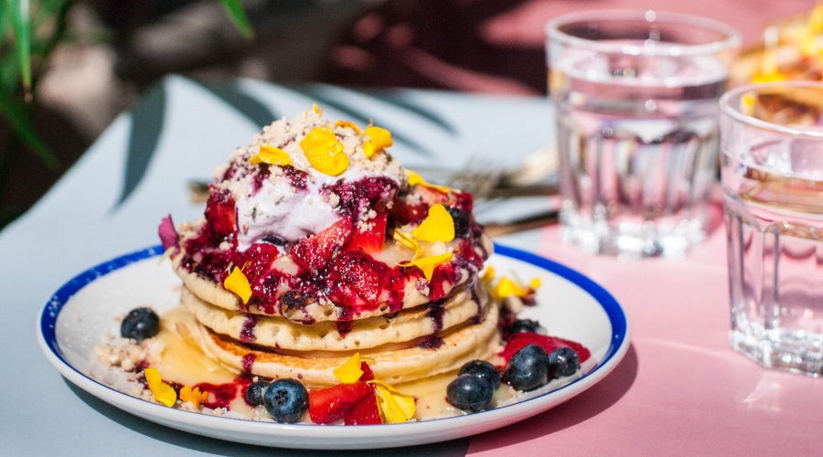 Pancakes with the lemon curd and blueberry sauce. Best in town!