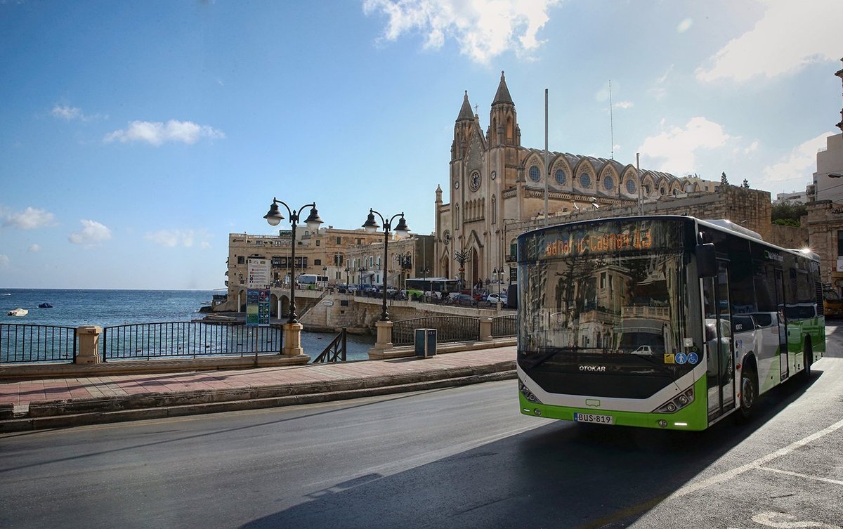 Maltese Bus in front of Knisja tal-Karmnu at Balutta Bay, Sliema
