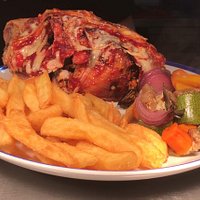 Rotisserie half hunters chicken with chips & roasted vegetables