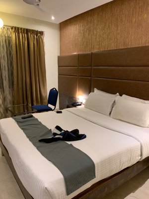 Sandesh Pride in Mysuru (Mysore), image may contain: Interior Design, Chair, Remote Control, Bed
