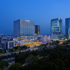 The hotel building of Swissôtel Jakarta PIK Avenue, located in the main Pantai Indah Kapuk boulevard