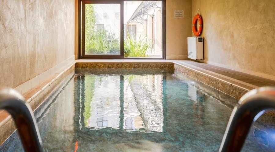 The heated indoor swimming pool at Flanders Hotel Bruges
