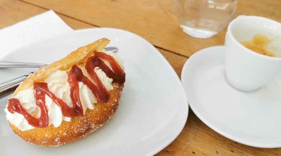 Cream filled doughnut with espresso