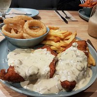 Loaded schnitty with creamy mushroom sauce