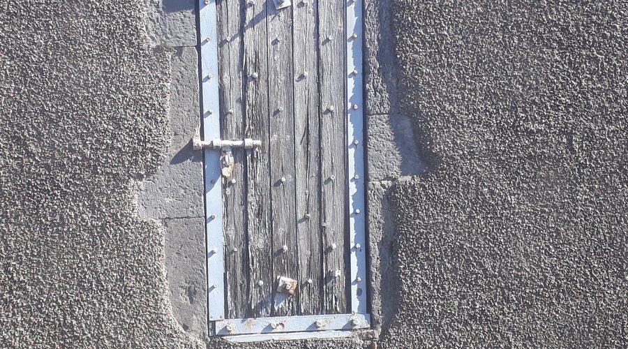 The gallows door in the gaol , they walked through and were hanged outside 