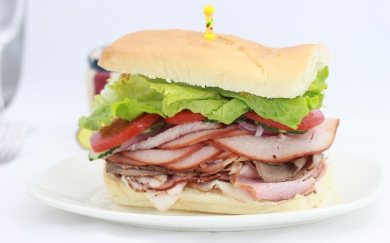 American Hero Sub, with roast beef, smoked ham, and smoked turkey
