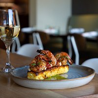 Shrimp & Grits
Grilled Corn Polenta, Charred Scallion Cilantro Aioli, Pepper Chutney.