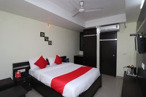 OYO 30715 Shakti Palace in Ramgarh, image may contain: Bedroom, Furniture, Bed, Indoors