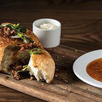 Everyone's favorite bread and housemade dipping oil.