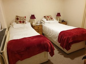St Benet's Abbey in Lanivet, image may contain: Furniture, Bed, Bedroom, Lamp