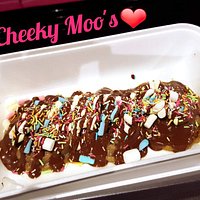 Cookie dough with hot nutella, rainbow sprinkles, and mini mallows.