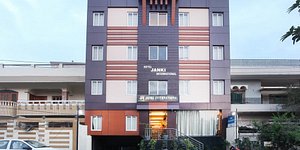 Hotel Janki International in Varanasi, image may contain: Apartment Building, City, High Rise, Urban