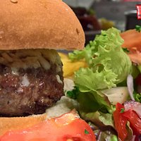 Char grilled 8oz Beef Burgers, your choice of cheese, bacon, salad and chips all included in the price. £9.95. Callenders Restaurant Hailsham East Sussex.