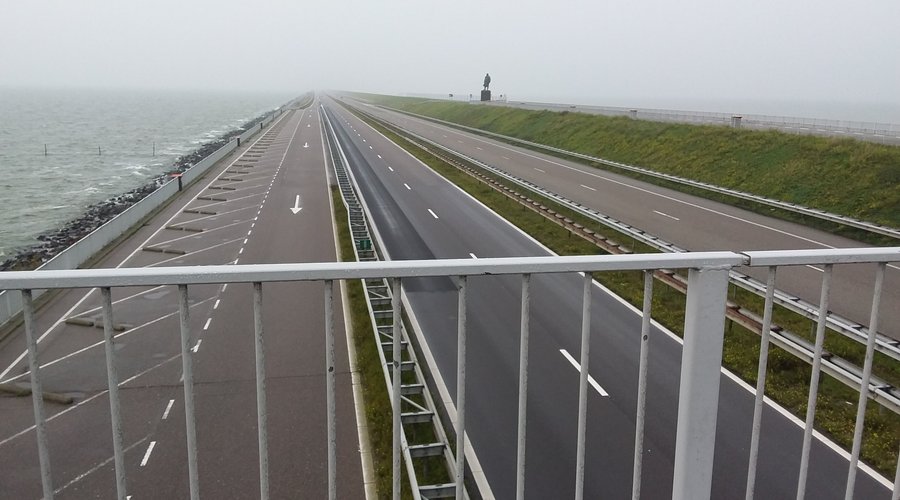 Bridge crosses over the Afsluitdijk. 