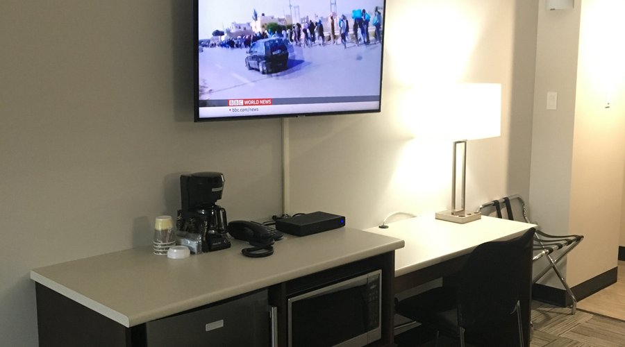 DELUXE DOUBLE QUEEN ROOM DESK WITH MICROWAVE AND BAR FRIDGE
