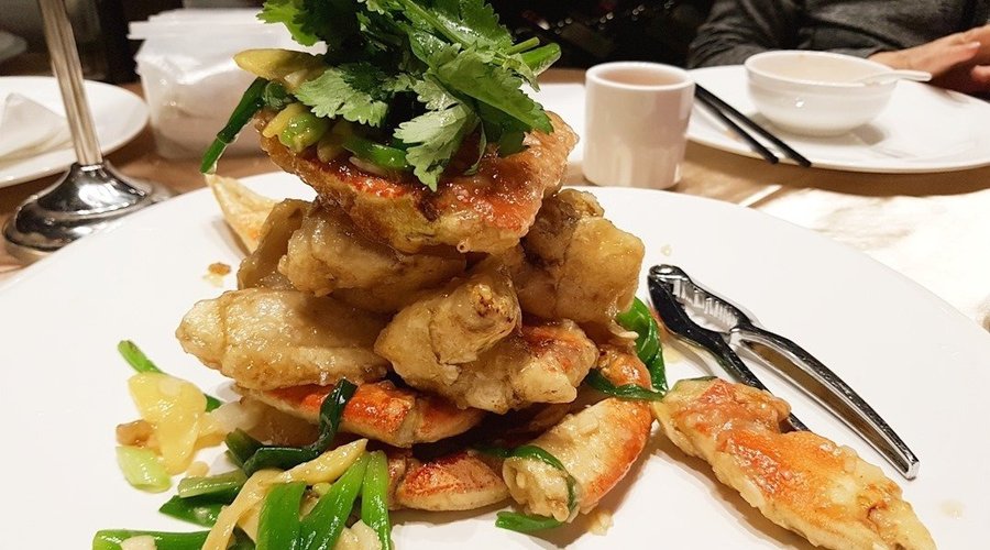 crab fried with green onion and ginger