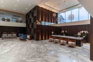 The Capital Hotel and Resort in Kerobokan Kelod, image may contain: Floor, Foyer, Indoors, Interior Design