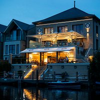 Exterior photo of the brasserie taken from the river