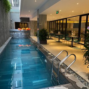 Satya Danang Hotel in Da Nang, image may contain: Pool, Water, Swimming Pool, Plant