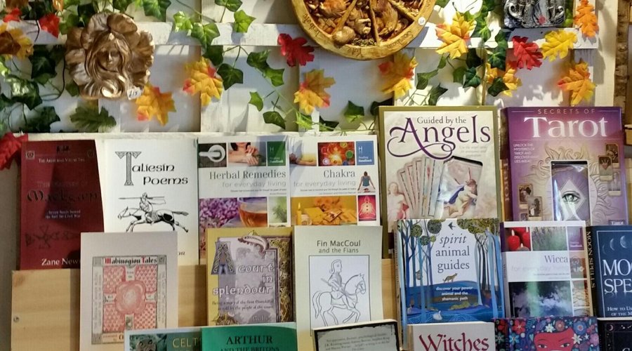 Green man and wheel of the year plaques. Books on all things spiritual and Welsh history
