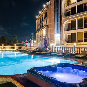 Outdoor heated infinity pool at GoldOne Hotel & Suites